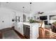 Spacious kitchen with island, stainless steel appliances, and white cabinets at 235 Goldenrod Cir, Salisbury, NC 28147