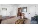 Upstairs landing with hardwood floors and antique furniture at 235 Goldenrod Cir, Salisbury, NC 28147