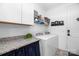 Laundry room with cabinets, shelving and granite countertop at 235 Goldenrod Cir, Salisbury, NC 28147