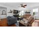 Spacious living room with comfortable seating and hardwood floors at 235 Goldenrod Cir, Salisbury, NC 28147