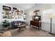 Sitting room features a gallery wall, comfy couch, and antique furniture at 235 Goldenrod Cir, Salisbury, NC 28147