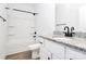 Bathroom features a granite countertop, undermount sink, and a shower-tub combo at 2365 28Th Ne St, Hickory, NC 28601