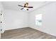Bright bedroom featuring modern ceiling fan, neutral walls, and light wood-look flooring at 2365 28Th Ne St, Hickory, NC 28601