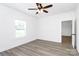 Bright, spacious bedroom featuring wood-look floors, a ceiling fan, and ample natural light at 2365 28Th Ne St, Hickory, NC 28601