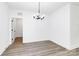 Dining room area showcasing modern lighting and light wood floors at 2365 28Th Ne St, Hickory, NC 28601