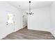 Bright dining area featuring modern lighting fixtures and light wood floors at 2365 28Th Ne St, Hickory, NC 28601
