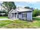 Lovely home featuring a covered porch, well-maintained lawn, and appealing architectural details at 2365 28Th Ne St, Hickory, NC 28601