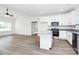 Open floor plan with a modern kitchen featuring an island and stainless steel appliances at 2365 28Th Ne St, Hickory, NC 28601