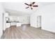 Open-concept floor plan with wood-look floors connecting the living room and kitchen at 2365 28Th Ne St, Hickory, NC 28601