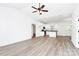 Open concept living space with wood-look floors, high ceilings, and abundant natural light at 2365 28Th Ne St, Hickory, NC 28601