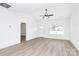 Spacious living area featuring wood-look flooring, neutral walls, and ample natural light at 2365 28Th Ne St, Hickory, NC 28601