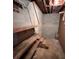 Unfinished basement with storage shelving and stairs at 319 N Peterson St, Stanley, NC 28164