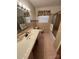 Updated bathroom with tile flooring, bathtub, and vanity at 319 N Peterson St, Stanley, NC 28164