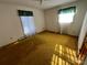 Spacious bedroom with neutral carpeting and natural light at 319 N Peterson St, Stanley, NC 28164