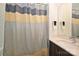 Bathroom with shower/tub combo and modern vanity at 416 Wesley Heights Way, Charlotte, NC 28208