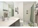 Clean bathroom with a single vanity and a shower/tub combo at 416 Wesley Heights Way, Charlotte, NC 28208