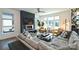 Comfortable living area with sectional sofa and statement wall at 416 Wesley Heights Way, Charlotte, NC 28208