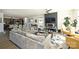 Open concept living room with fireplace and large TV at 416 Wesley Heights Way, Charlotte, NC 28208