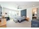 Spacious main bedroom with a large window and en suite bathroom at 416 Wesley Heights Way, Charlotte, NC 28208