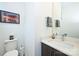 Modern powder room with a quartz vanity and a sleek design at 416 Wesley Heights Way, Charlotte, NC 28208