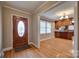 Inviting entryway with hardwood floors and view into kitchen at 4193 Walker Rd, Rock Hill, SC 29730