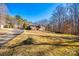 Ranch house with large yard, driveway, and mature trees at 4193 Walker Rd, Rock Hill, SC 29730