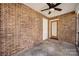 Screened porch with brick walls and ceiling fan at 4193 Walker Rd, Rock Hill, SC 29730