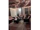 Relaxing outdoor patio with comfortable seating and warm lighting at 490 Melvista Ave, Rock Hill, SC 29732