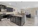 Spacious open-concept kitchen featuring a center island, stainless steel appliances, and modern finishes at 490 Melvista Ave, Rock Hill, SC 29732