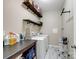 Efficient laundry room with modern appliances, counter space, and practical storage solutions at 490 Melvista Ave, Rock Hill, SC 29732