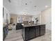 Open-concept living area with a kitchen island, comfortable seating, and plenty of natural light at 490 Melvista Ave, Rock Hill, SC 29732
