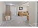 Cozy loft area with comfortable seating, neutral carpet, and a relaxing atmosphere at 490 Melvista Ave, Rock Hill, SC 29732