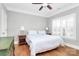 Bright bedroom with hardwood floors, plantation shutters, and ceiling fan at 535 Chalmers Row, Rock Hill, SC 29732