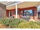 Welcoming front porch with brick columns and comfortable seating area at 535 Chalmers Row, Rock Hill, SC 29732