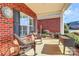 Relaxing front porch with rocking chairs and landscaping at 535 Chalmers Row, Rock Hill, SC 29732