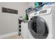 Convenient laundry room with washer, dryer, and shelving at 535 Chalmers Row, Rock Hill, SC 29732