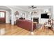 Cozy living room featuring hardwood floors, a fireplace, and a large leather sofa at 535 Chalmers Row, Rock Hill, SC 29732