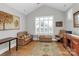 Bright office features hardwood floors, plantation shutters, and comfortable seating at 535 Chalmers Row, Rock Hill, SC 29732