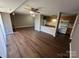 Open kitchen with light wood cabinets and white appliances at 9401 Old Concord Rd # K, Charlotte, NC 28213