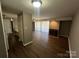 Bright living room with hardwood floors, fireplace and sliding glass doors at 9401 Old Concord Rd # K, Charlotte, NC 28213