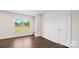 Bright bedroom with hardwood floors, neutral walls, and a window at 1029 20Th Avenue Se Loop, Hickory, NC 28602