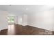 Spacious living room with hardwood floors and neutral walls at 1029 20Th Avenue Se Loop, Hickory, NC 28602