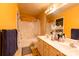 Bathroom with double vanity, tub, and shower at 12548 Hennigan Place Ln, Charlotte, NC 28214