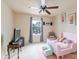 Small bedroom with a twin bed and ceiling fan at 12548 Hennigan Place Ln, Charlotte, NC 28214