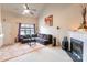 Living room features a fireplace and high ceiling at 12548 Hennigan Place Ln, Charlotte, NC 28214