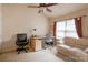 Home office with a desk, chair, and sofa at 12548 Hennigan Place Ln, Charlotte, NC 28214