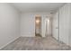 Bedroom featuring carpet and access to an ensuite bathroom at 133 Orchard Trace Ln # 7, Charlotte, NC 28213