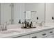 Double vanity bathroom with a large mirror at 330 Simeon Dr, Charlotte, NC 28208
