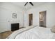 Bright bedroom with double doors and en-suite bathroom at 330 Simeon Dr, Charlotte, NC 28208