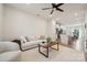 Open concept living room and kitchen with neutral decor and hardwood floors at 330 Simeon Dr, Charlotte, NC 28208